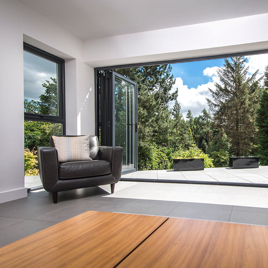 Conservatory with open doors and windows