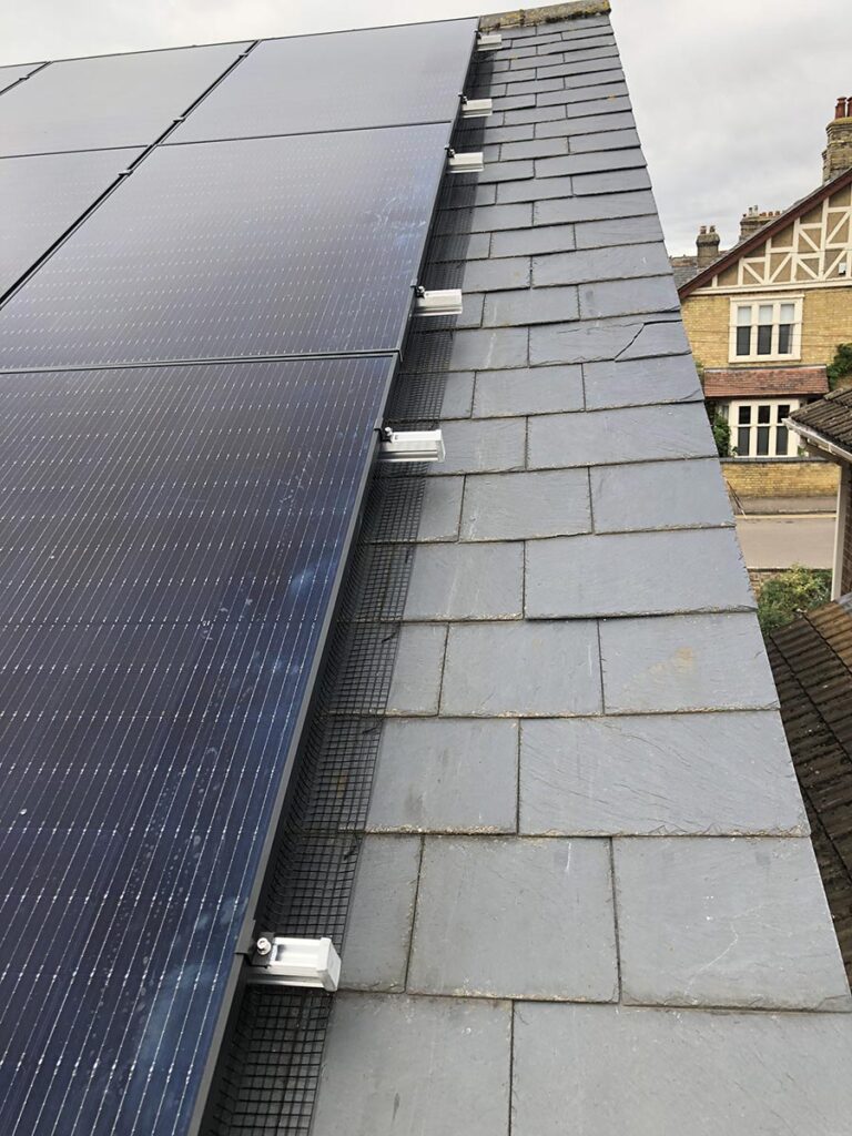 Solar panels attached to a tiled roof