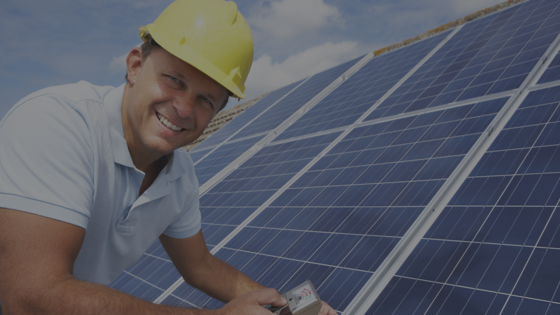 workman installing solar panels